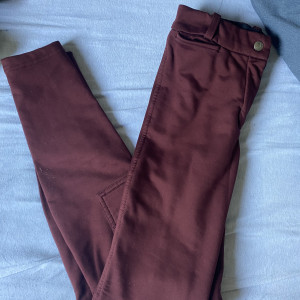 Pantalon équitation Fouganza rouge (8 ans) occasion